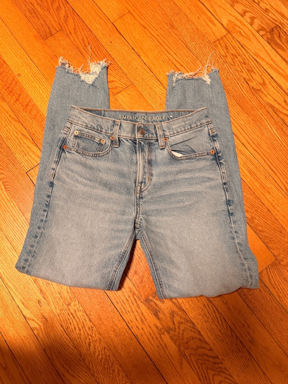 American Eagle Outfitters Light Wash Frayed Hem Cropped Jeans